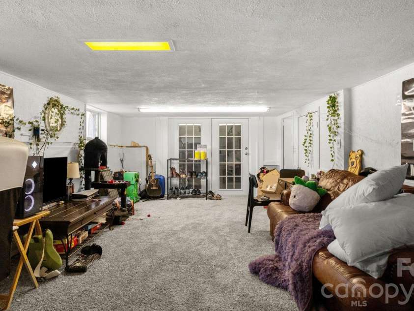 1476 Charlotte Highway, Mooresville, NC 28115.  MLS# CAR4419978, YatesRealty ID 55873. Basement/Rec Room