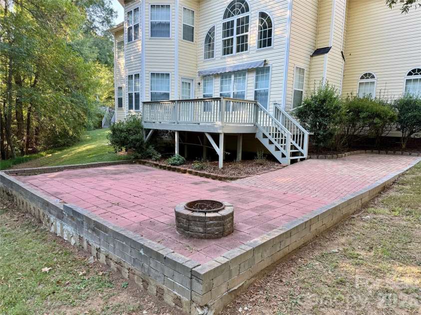 1503 Copperplate Road, Charlotte, NC 28262.  MLS# CAR4429268, YatesRealty ID 55875. Backyard Patio and Fire Pit
