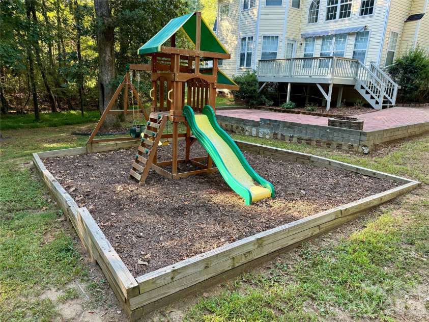 1503 Copperplate Road, Charlotte, NC 28262.  MLS# CAR4429268, YatesRealty ID 55875. Backyard Playground