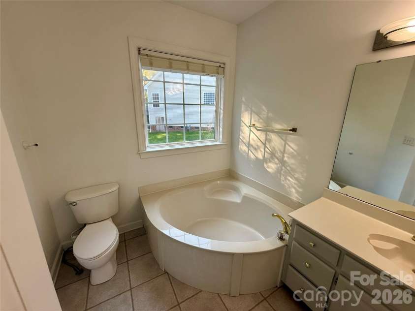 1503 Copperplate Road, Charlotte, NC 28262.  MLS# CAR4429268, YatesRealty ID 55875. Downstairs Master Bathroom
