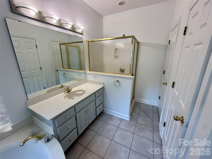 1503 Copperplate Road, Charlotte, NC 28262.  MLS# CAR4429268, YatesRealty ID 55875. Downstairs Master Bathroom