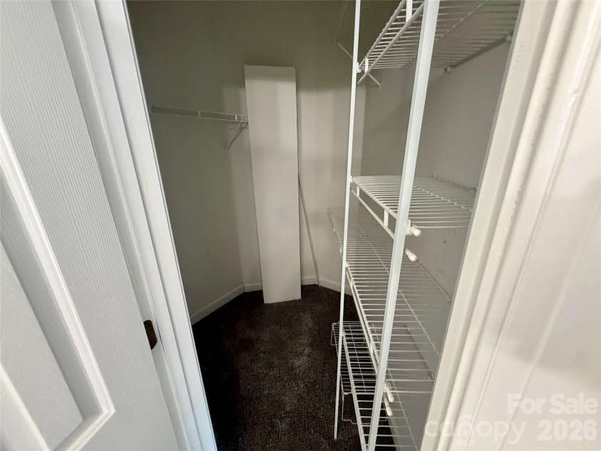 1503 Copperplate Road, Charlotte, NC 28262.  MLS# CAR4429268, YatesRealty ID 55875. Downstairs Master Bathroom Closet