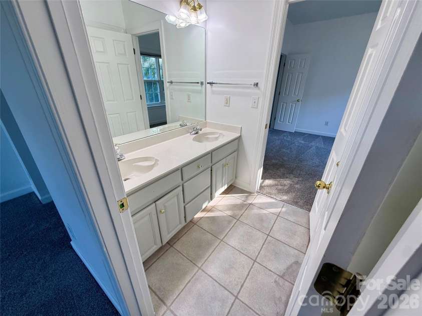 1503 Copperplate Road, Charlotte, NC 28262.  MLS# CAR4429268, YatesRealty ID 55875. Jack and Jill Bathroom