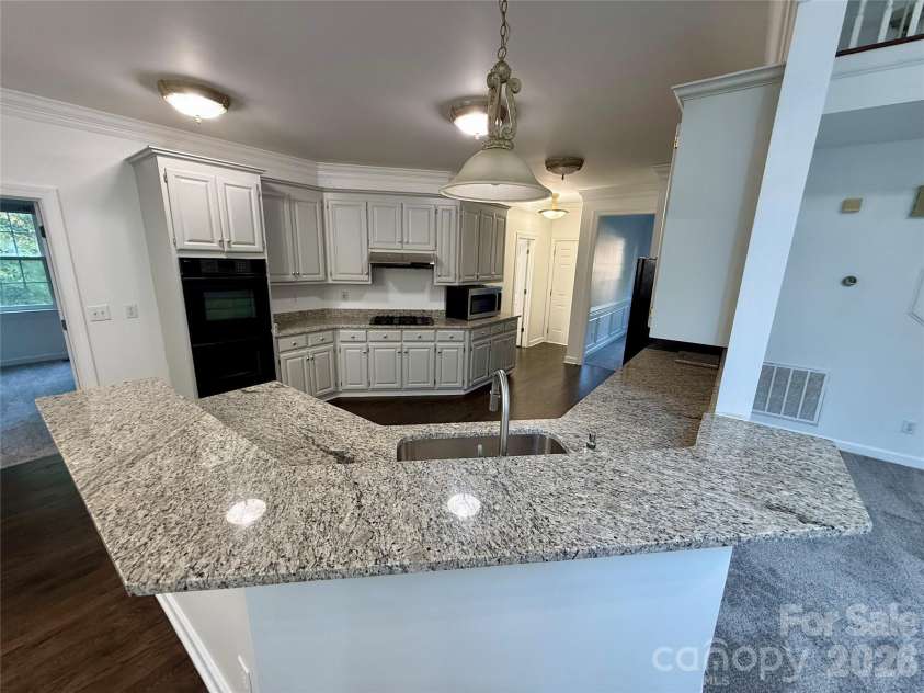 1503 Copperplate Road, Charlotte, NC 28262.  MLS# CAR4429268, YatesRealty ID 55875. Kitchen Bar Top