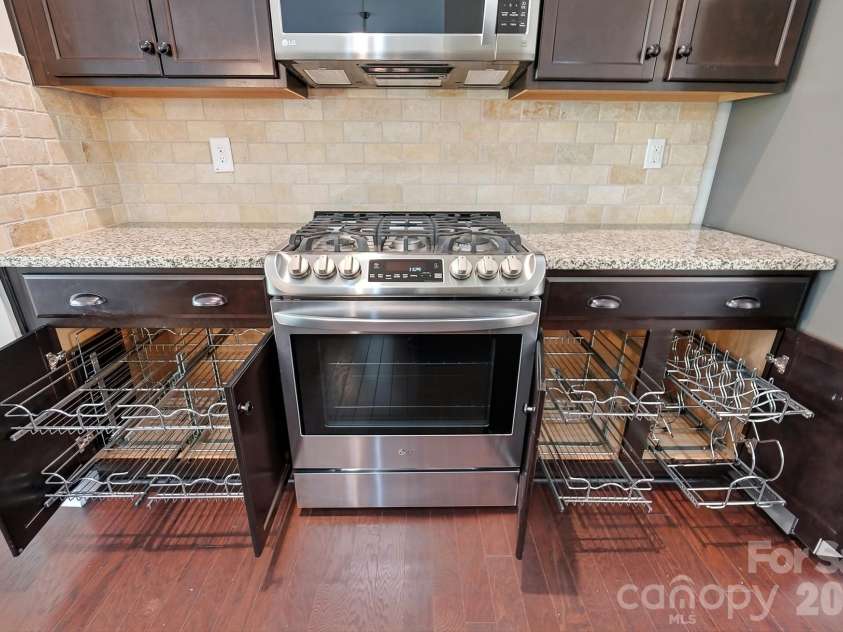 9106 Longvale Lane, Charlotte, NC 28214.  MLS# CAR4432949, YatesRealty ID 55876. Built-in slide drawer
