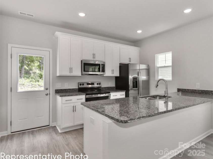 556 Ridge Avenue, Mooresville, NC 28115.  MLS# CAR4245247, YatesRealty ID 5589. *This photo is a representation of what is being built.
