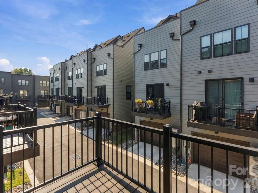 3028 Terroir Lane, Charlotte, NC 28217.  MLS# CAR4432110, YatesRealty ID 55897. Balcony off Dining Area