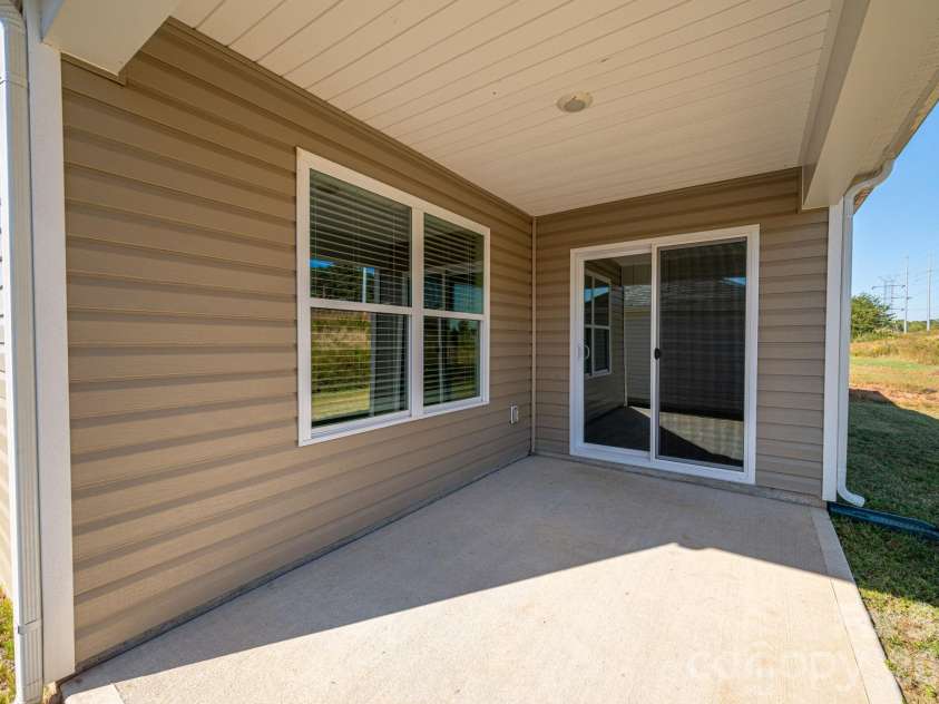 1021 Foxberry Lane, Maiden, NC 28650.  MLS# CAR4433101, YatesRealty ID 55939. Back Patio