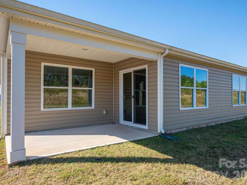 1021 Foxberry Lane, Maiden, NC 28650.  MLS# CAR4433101, YatesRealty ID 55939. Back Patio with access to dining area through sliding doors