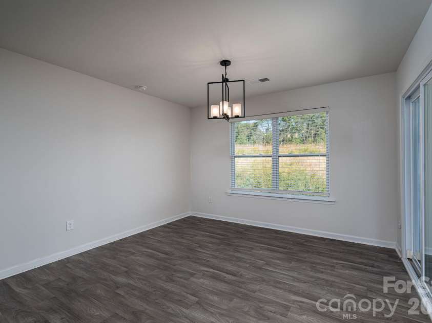 1021 Foxberry Lane, Maiden, NC 28650.  MLS# CAR4433101, YatesRealty ID 55939. Dining Area leads to back patio