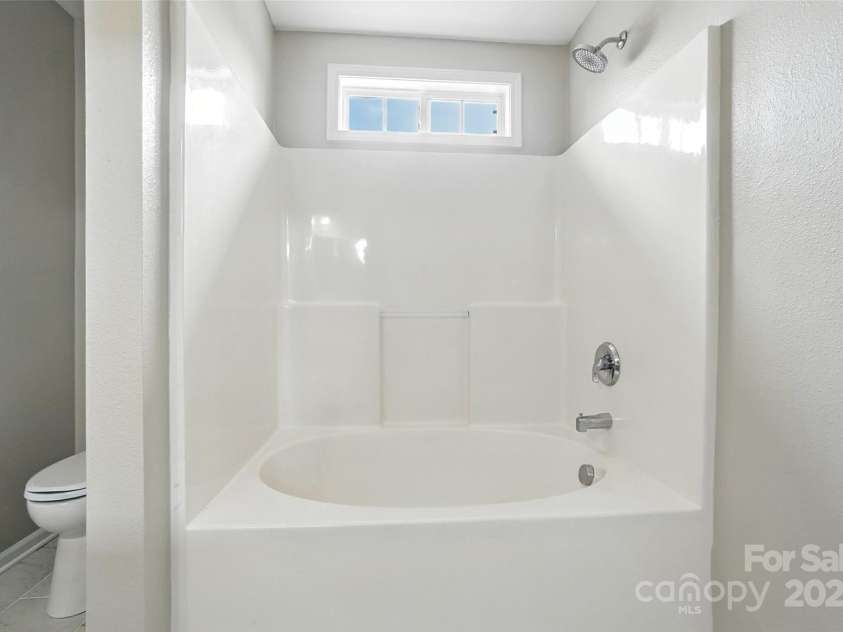 4133 Carl Parmer Drive, Harrisburg, NC 28075.  MLS# CAR4288462, YatesRealty ID 5595. Primary Bathroom
