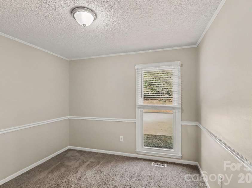 8204 Strawberry Point Drive, Charlotte, NC 28215.  MLS# CAR4432654, YatesRealty ID 55951. 