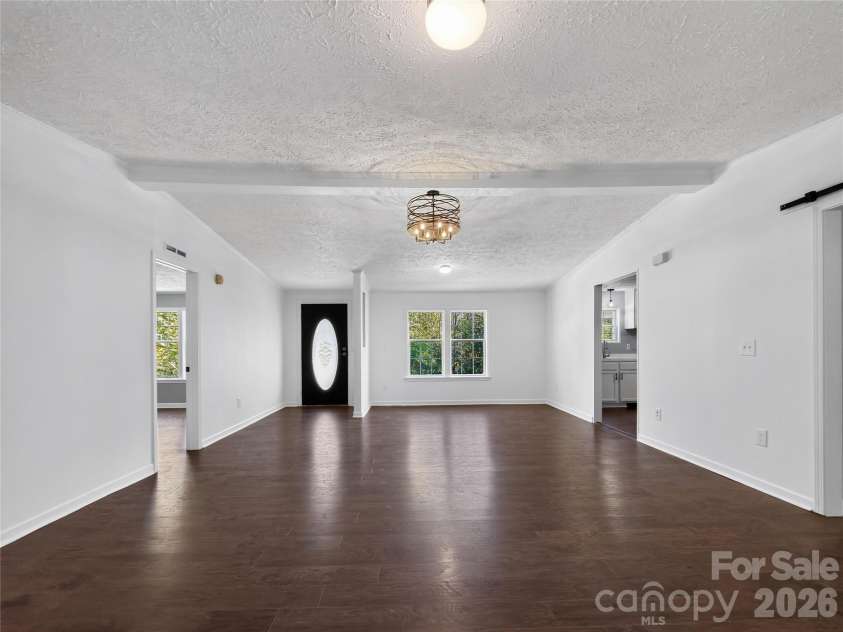 124 Tyler Terrace, Rutherfordton, NC 28139.  MLS# CAR4431827, YatesRealty ID 55954. Great Room w/Dining Area