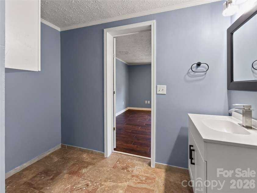 124 Tyler Terrace, Rutherfordton, NC 28139.  MLS# CAR4431827, YatesRealty ID 55954. Primary Bathroom