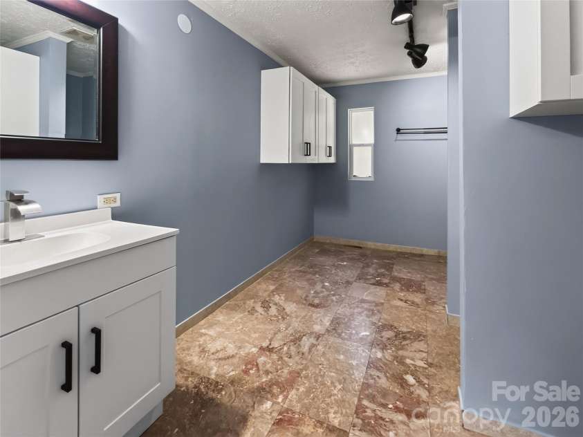 124 Tyler Terrace, Rutherfordton, NC 28139.  MLS# CAR4431827, YatesRealty ID 55954. Primary Bathroom