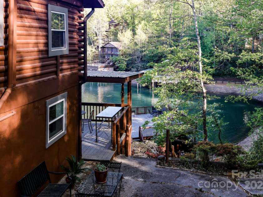 118 Rock Point Road, Lake Lure, NC 28746.  MLS# CAR4246050, YatesRealty ID 5596. 