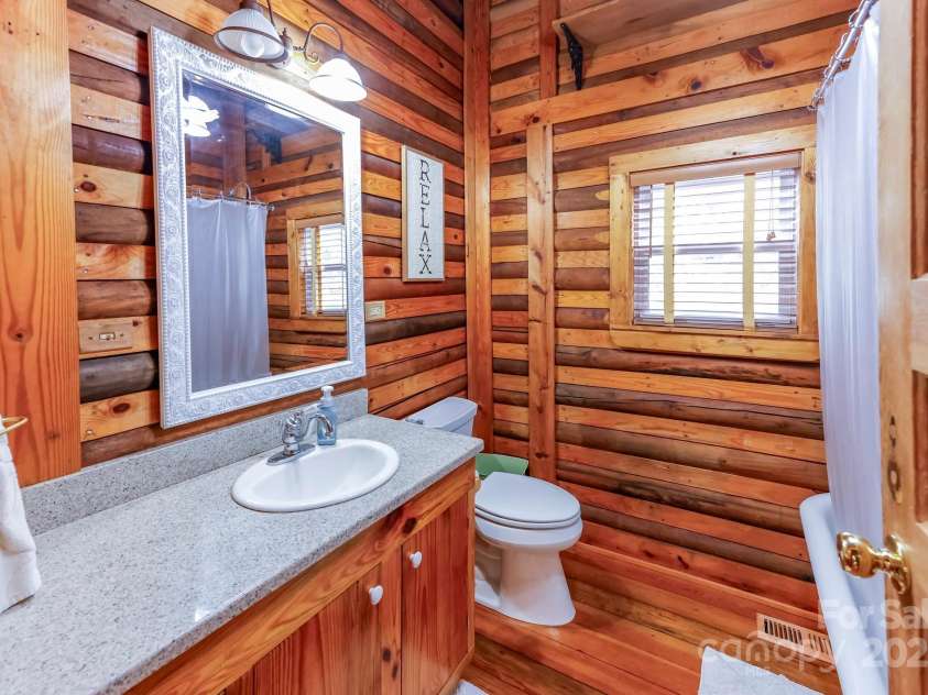 118 Rock Point Road, Lake Lure, NC 28746.  MLS# CAR4246050, YatesRealty ID 5596. 