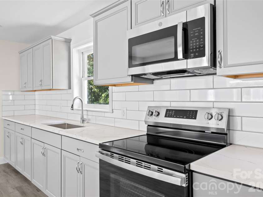 105 Dogwood Street, Locust, NC 28097.  MLS# CAR4432582, YatesRealty ID 55965. 