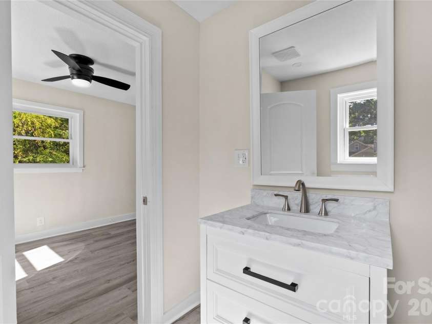 105 Dogwood Street, Locust, NC 28097.  MLS# CAR4432582, YatesRealty ID 55965. Primary bath
