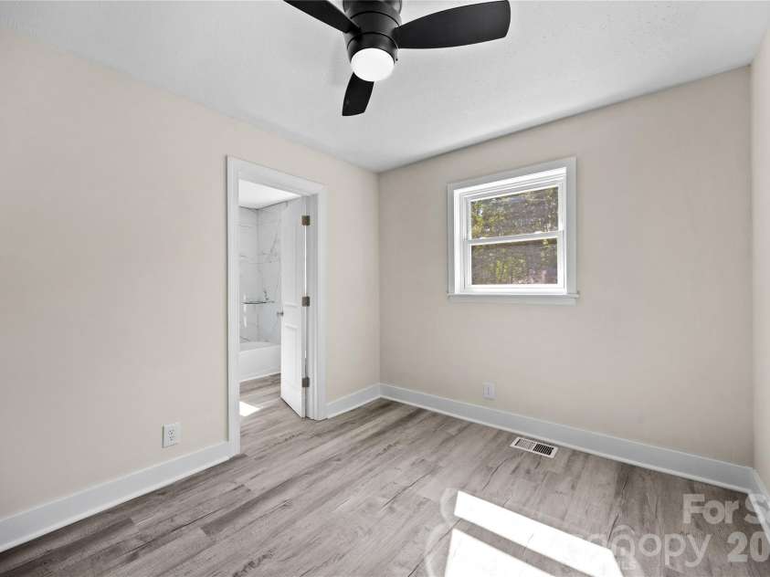 105 Dogwood Street, Locust, NC 28097.  MLS# CAR4432582, YatesRealty ID 55965. Primary bedroom