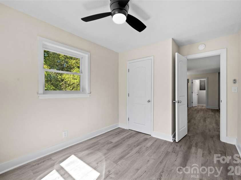 105 Dogwood Street, Locust, NC 28097.  MLS# CAR4432582, YatesRealty ID 55965. Primary bedroom