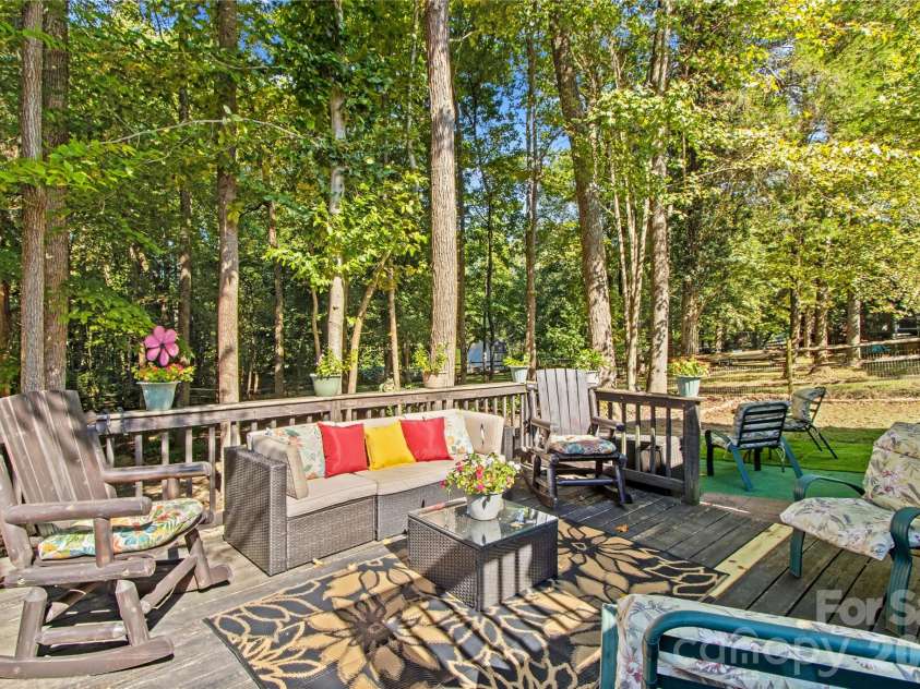 133 Flowering Grove Lane, Mooresville, NC 28115.  MLS# CAR4433429, YatesRealty ID 55982. Backyard deck