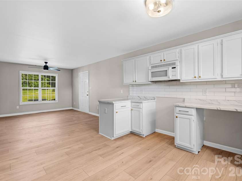 2065 Gary Lane, Hickory, NC 28602.  MLS# CAR4433074, YatesRealty ID 55987. KITCHEN 2.Countertop;Calacatta3X12 subway tiles backsplash