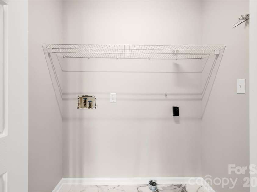 2065 Gary Lane, Hickory, NC 28602.  MLS# CAR4433074, YatesRealty ID 55987. Laundry ClosetNew Tile floor, paint