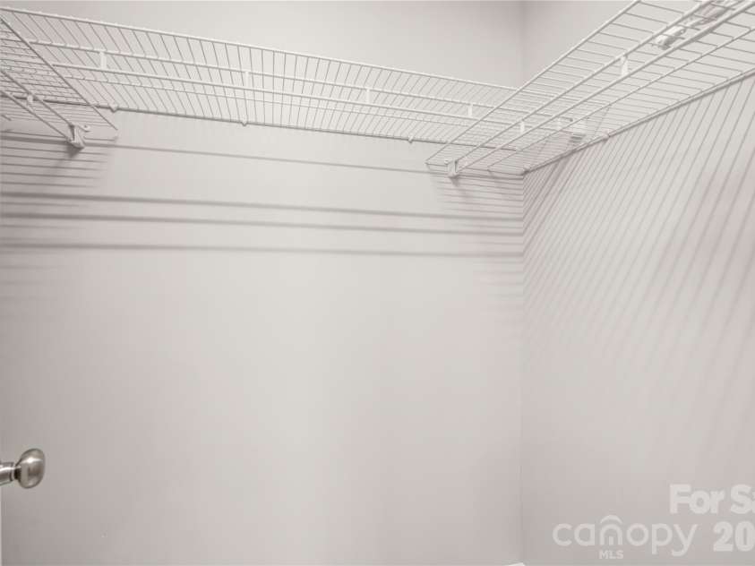 2065 Gary Lane, Hickory, NC 28602.  MLS# CAR4433074, YatesRealty ID 55987. Master Bathroom Walk inn closet