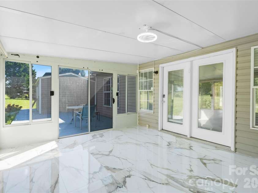 2065 Gary Lane, Hickory, NC 28602.  MLS# CAR4433074, YatesRealty ID 55987. SUNROOM2CALACATTA TILE 24X48