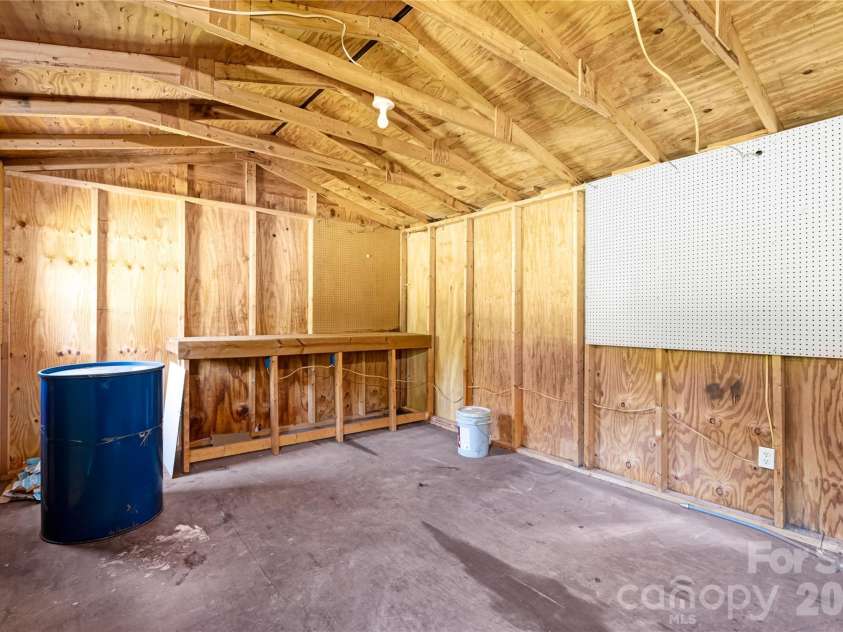 2065 Gary Lane, Hickory, NC 28602.  MLS# CAR4433074, YatesRealty ID 55987. Vinyl Exterior Wood Barn-Workshop