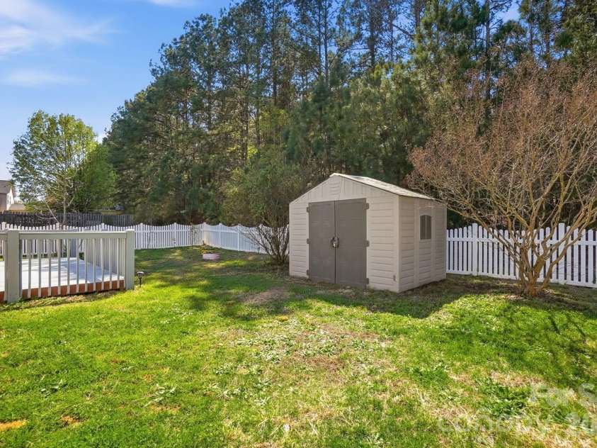 555 Annalinde Lane, Rock Hill, SC 29732.  MLS# CAR4359348, YatesRealty ID 5599. Storage Shed in Backyard