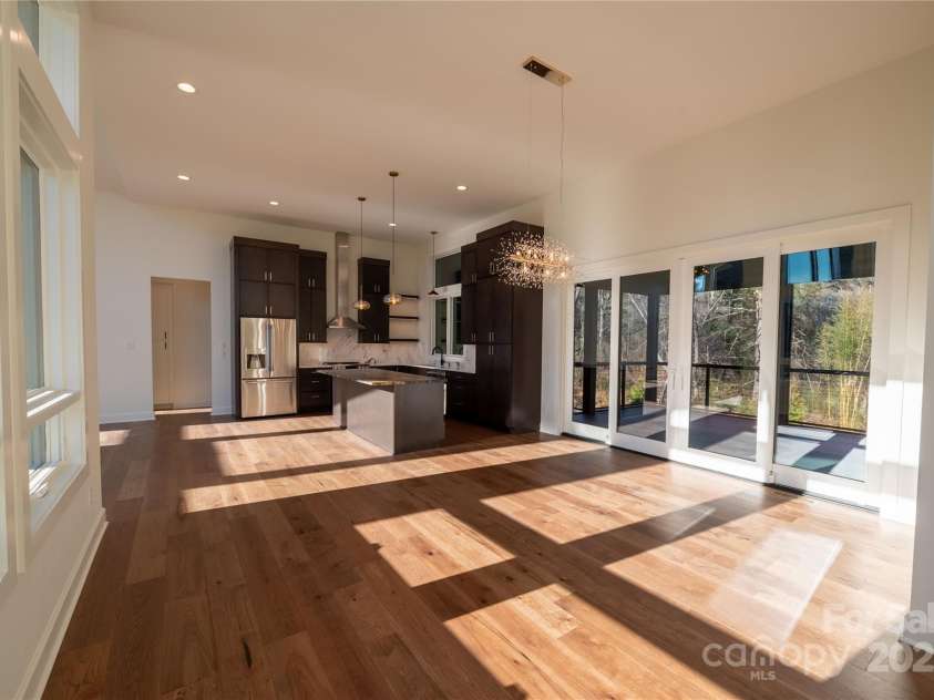 11 Kiftsgate Court, Asheville, NC 28804.  MLS# CAR4329278, YatesRealty ID 560. Kitchen Dining and Porch