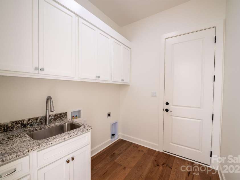 11 Kiftsgate Court, Asheville, NC 28804.  MLS# CAR4329278, YatesRealty ID 560. Laundry