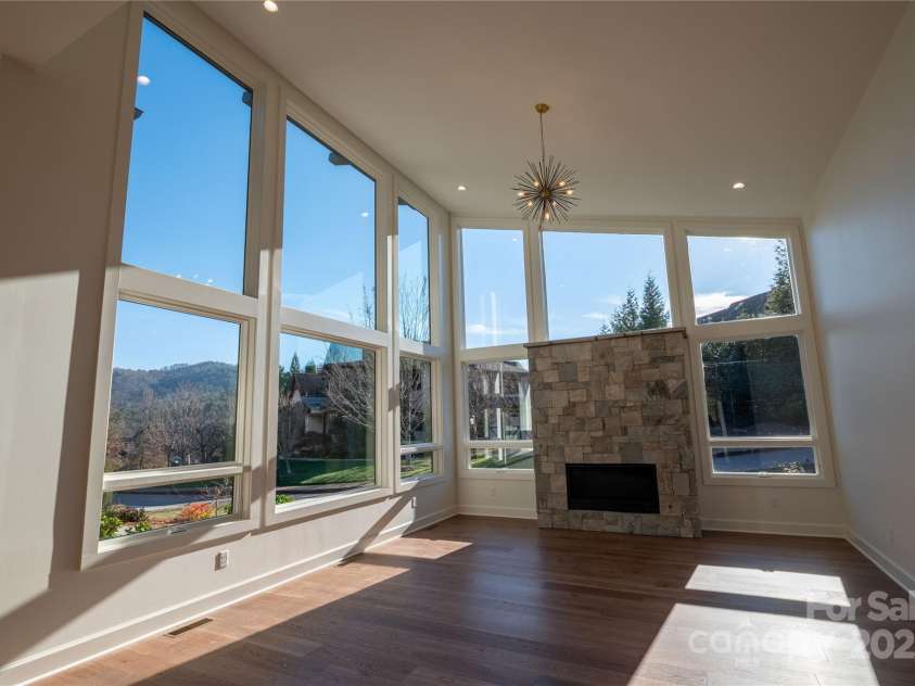 11 Kiftsgate Court, Asheville, NC 28804.  MLS# CAR4329278, YatesRealty ID 560. Living Room with Mountain Views