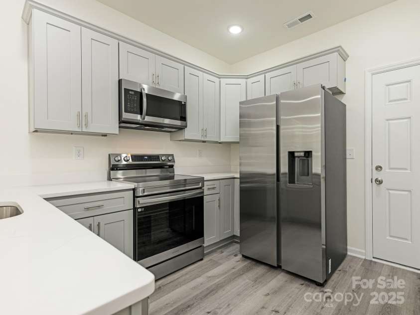 4470 Kingsbury Road, Midland, NC 28107.  MLS# CAR4318341, YatesRealty ID 560. Quartz & Stainless quality(representative photo)