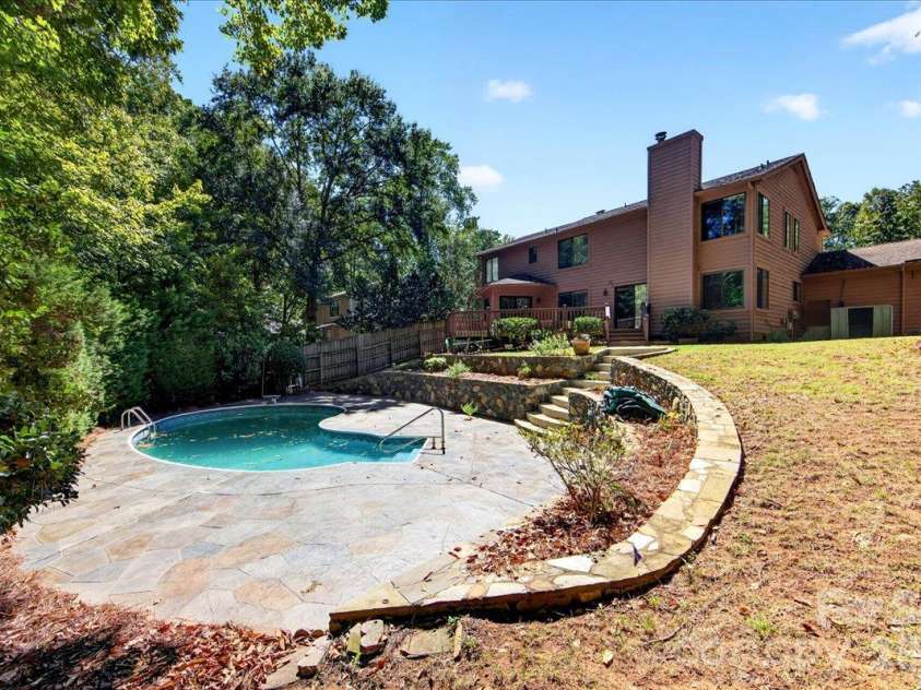 6133 Rhone Drive, Charlotte, NC 28226.  MLS# CAR4431409, YatesRealty ID 56002. 
