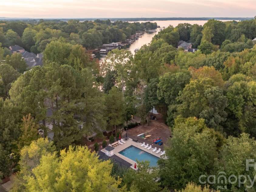 20315 Southshore Drive, Cornelius, NC 28031.  MLS# CAR4431312, YatesRealty ID 56005. Community pool with lake view and lake access