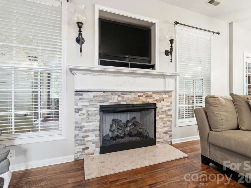 1121 Deep Hollow Court, Waxhaw, NC 28173.  MLS# CAR4431905, YatesRealty ID 56009. Fireplace in Great Room