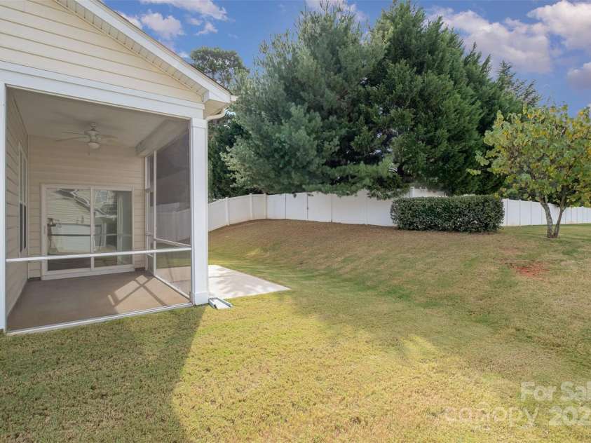 151 Glade Valley Avenue, Mooresville, NC 28117.  MLS# CAR4192412, YatesRealty ID 5601. Screened  patio