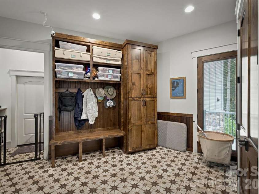 155 Otter Waller Drive, Nebo, NC 28761.  MLS# CAR4427161, YatesRealty ID 56025. Mud room