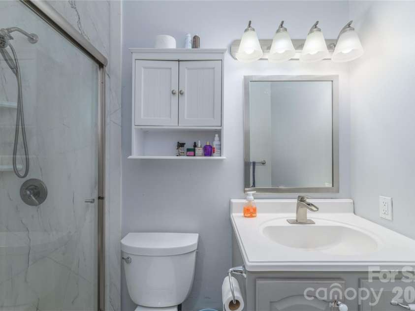 19 Springwood Drive, Asheville, NC 28805.  MLS# CAR4430580, YatesRealty ID 56029. Second full bathroom hallway location