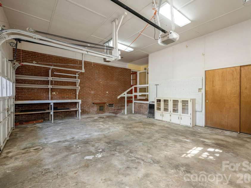 224 Lyndale Road, Hendersonville, NC 28739.  MLS# CAR4418202, YatesRealty ID 56030. 2-Car Garage with built-in workbenches