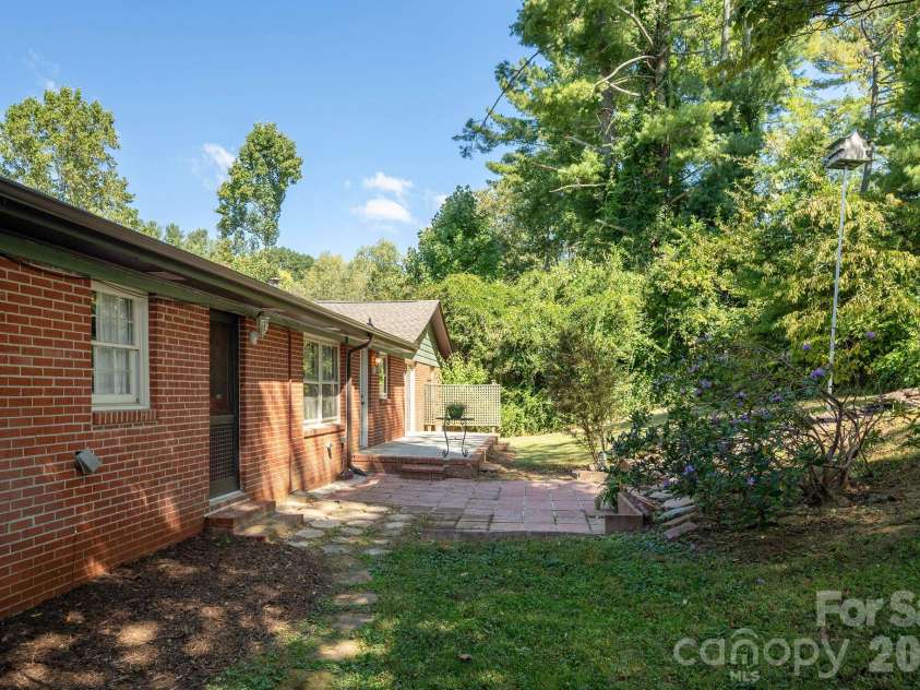 224 Lyndale Road, Hendersonville, NC 28739.  MLS# CAR4418202, YatesRealty ID 56030. Backyard and patio
