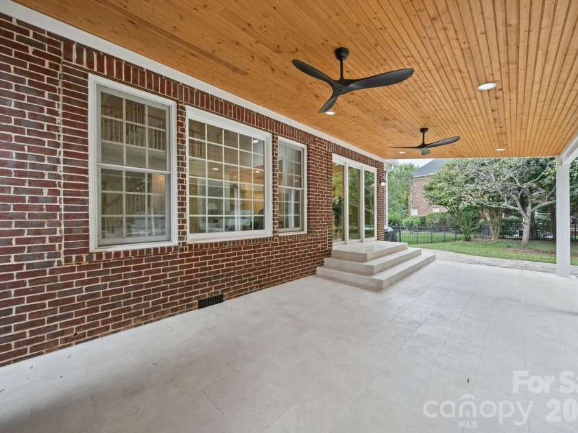 15025 Jockeys Ridge Drive, Charlotte, NC 28277.  MLS# CAR4429098, YatesRealty ID 56032. Covered Patio