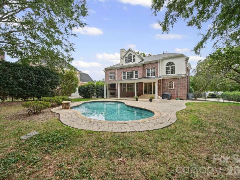 15025 Jockeys Ridge Drive, Charlotte, NC 28277.  MLS# CAR4429098, YatesRealty ID 56032. Pool and Backyard
