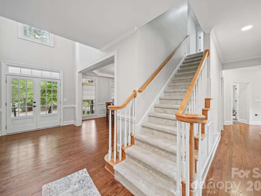 15025 Jockeys Ridge Drive, Charlotte, NC 28277.  MLS# CAR4429098, YatesRealty ID 56032. Staircase to Second Floor