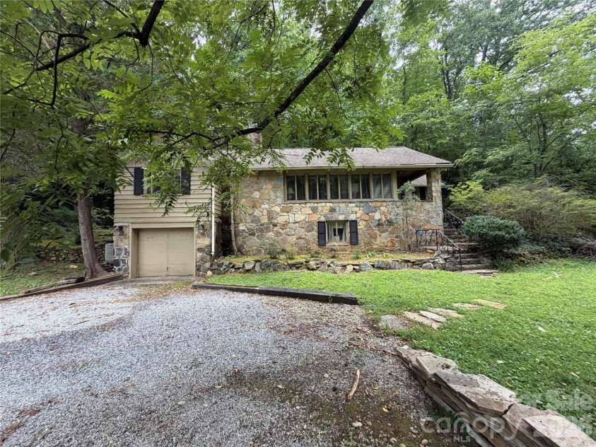 459 Warrior Drive, Tryon, NC 28782.  MLS# CAR4414270, YatesRealty ID 56039. Front