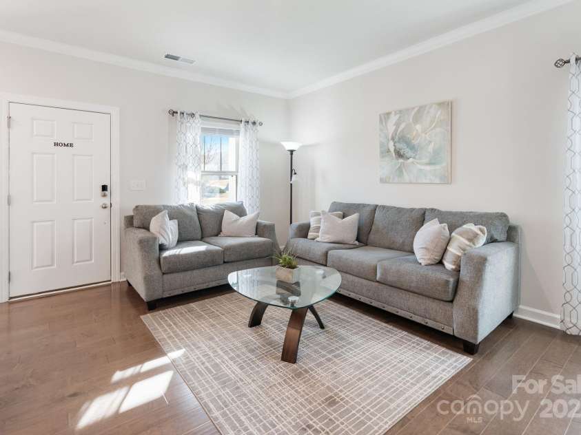 12425 Larue Lane, Huntersville, NC 28078.  MLS# CAR4231476, YatesRealty ID 5604. Family room open to kitchen area  - perfect for entertaining