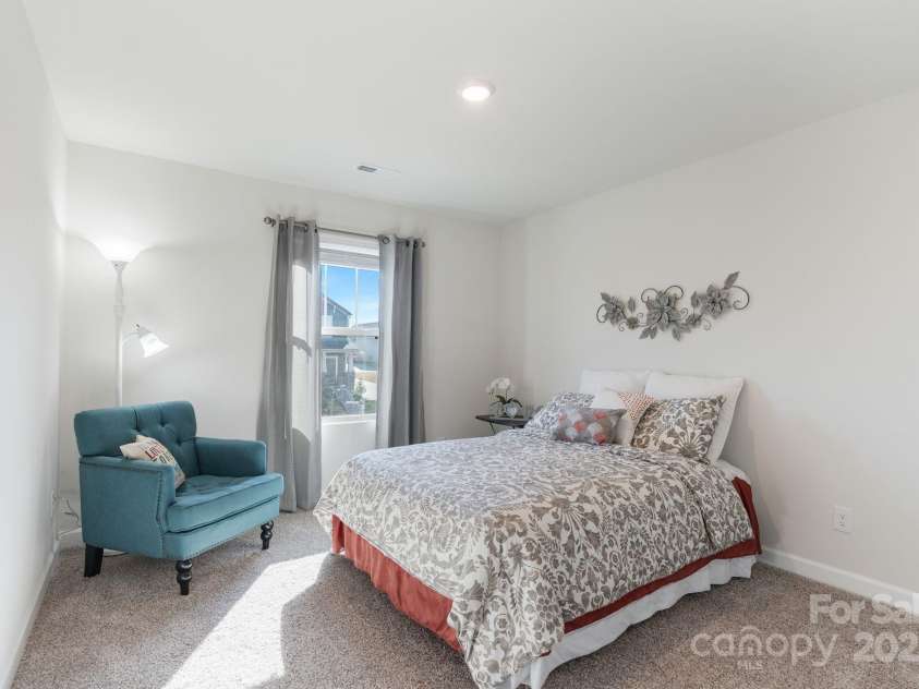 12425 Larue Lane, Huntersville, NC 28078.  MLS# CAR4231476, YatesRealty ID 5604. Guest bedroom with walk-in closet